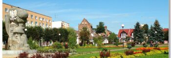 Beja - Ville historique et campagne ensoleillée en arrière-plan.